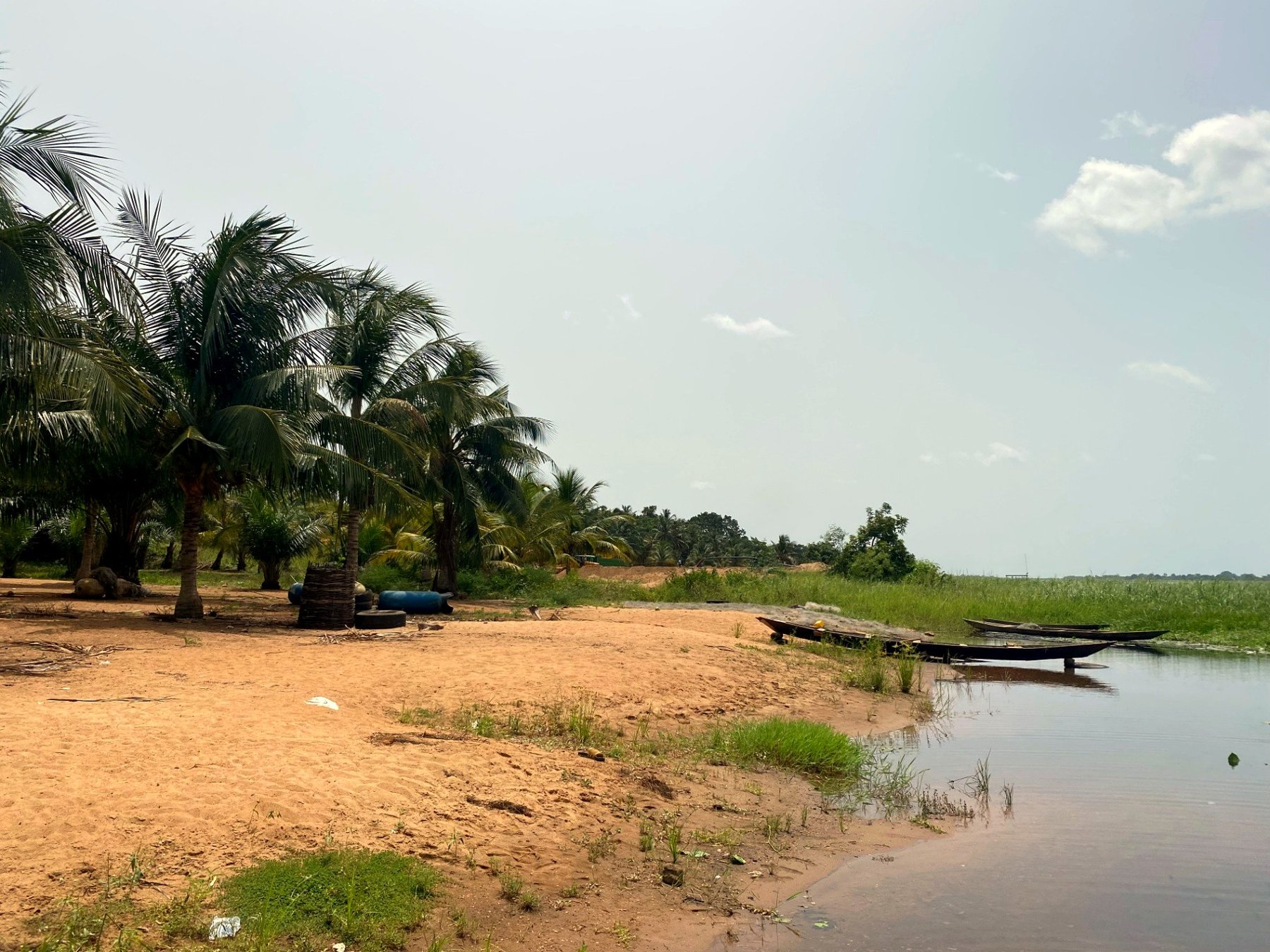 Sandy landing point with a dugout canoe at Tefle Destination today
